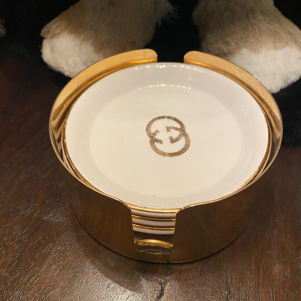 Authentic Gold rimmed luxury rare GUCCI plate coaster set with holder